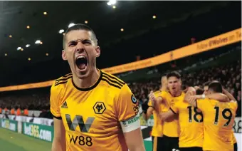  ?? CARL RECINE REUTERS ?? CONOR COADY celebrates after Diogo Jota scores Wolves’ second goal against Manchester United in the FA Cup on Saturday. |