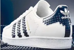  ?? ?? These Adidas sneakers were a collab with Lego.