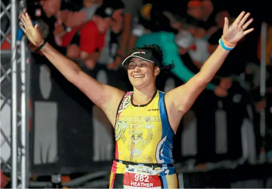  ?? MARK TAYLOR FAIRFAX NZ ?? Heather Skipworth conquering the finish line of Iron Maori last year.