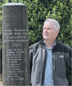  ?? PHOTO: LINDA ROBERTSON ?? Taking stock . . . St John intensive care paramedic Doug Flett pays his respects at a memorial to the victims of the Aramoana massacre, which he responded to in 1990.