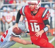  ?? MEDIANEWS GROUP FILE PHOTO ?? Upper Dublin quarterbac­k Ryan Stover scrambles as he is pressured by Parkland defenders during second-half action of their PIAA 4A football semifinal contest at Souderton Area High School on Saturday December 12, 2015.