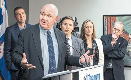  ?? ANDREW FRANCIS WALLACE TORONTO STAR ?? GTA mayors, from left, John Taylor (Newmarket), Frank Scarpitti (Markham), Patrick Brown (Brampton), Marianne Meed Ward (Burlington) and Gord Krantz (Milton), who were at Toronto city hall for a meeting with John Tory, react to the news Doug Ford has ordered a review of regional government in the province.