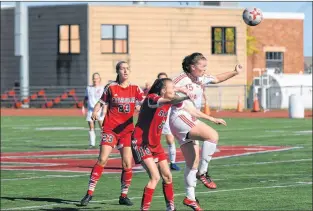  ?? ACADIA UNIVERSITY ATHLETICS PHOTO ?? Memorial Sea-hawks midfielder Nicole Torraville (right) goes up for a ball during an Atlantic University Sport women’s soccer game in Wolfville, N.S., on Sunday. The Sea-hawks and host Acadia Axewomen played to a scoreless draw.