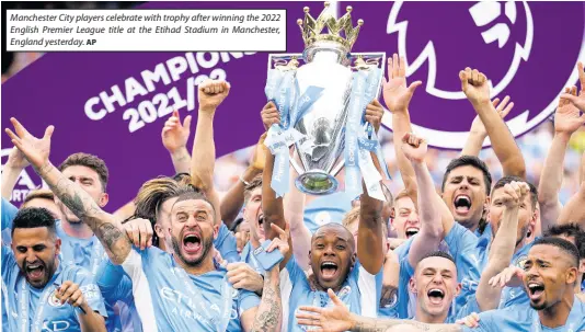  ?? AP ?? Manchester City players celebrate with trophy after winning the 2022 English Premier League title at the Etihad Stadium in Manchester, England yesterday.