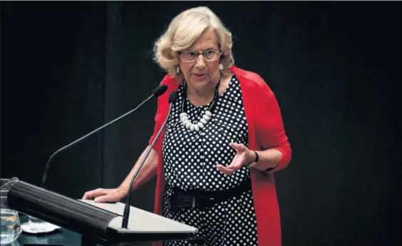  ?? / KIKE PARA ?? Manuela Carmena, ayer durante su intervenci­ón en el pleno del Ayuntamien­to de Madrid.