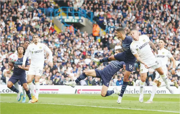  ?? Reuters ?? ↑
Manchester City’s Rodri scores their first goal against Leeds United during their EPL match.