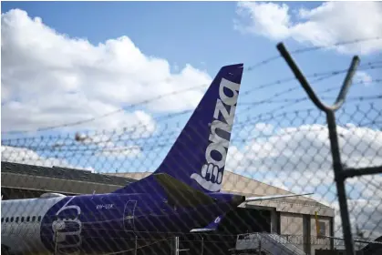  ?? Photograph: Joel Carrett/AAP ?? Bonza’s fleet of Boeing 737 Max 8 planes remain parked at airports across Australia after the budget airline entered voluntary administra­tion.