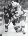  ?? AP/CHRIS O’MEARA ?? Tampa Bay right wing Ryan Callahan (24) and New York Rangers defenseman Keith Yandle (93) battle for control of the puck during the second period of Game 4 of the NHL Eastern Conference finals. The Rangers cruised to a 5-1 victory to tie the series at...