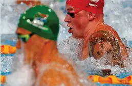  ?? REUTERS ?? Lion tamed: Peaty (right) is edged into second place