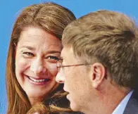  ?? REUTERS ?? Melinda Gates smiles at her husband Bill during the opening news conference for AIDS 2006, the XVI Internatio­nal AIDS conference in Toronto, in a photo taken on Aug.13, 2006.