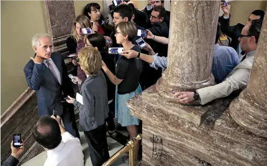  ??  ?? THE DO-NOTHING CONGRESS: Republican Senator Bob Corker talks to reporters at the U.S. Capitol in July. He and his GOP colleagues failed to repeal and replace Obamacare, despite years of promises.