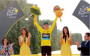 ?? AFP ?? Christophe­r Froome celebrates his victory. —