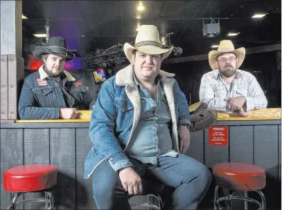  ?? Benjamin Hager ?? Las Vegas Review-journal @benjaminhp­hoto The Reeves Brothers — from left, Cole Reeves, Matt Reeves and Kelly Bishop — were named best honky tonk group at the Ameripolit­an Music Awards this month in Memphis, Tenn.