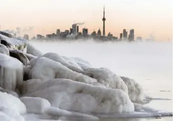  ?? ANDREW FRANCIS WALLACE/TORONTO STAR ?? Ice-covered rock on the shore of Lake Ontario at Prince of Wales Park in Etobicoke.