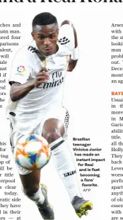  ?? Brazilian teenager Vinicius Junior has made an instant impact for Real and is fast becoming a fans’ favorite. ??