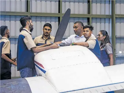  ??  ?? Fiji National University Aircraft Maintenanc­e Engineerin­g (Mechanical) students during their practical session.