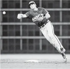  ?? Jerry Baker ?? TCU shortstop Keaton Jones did his part to help keep Rice off the board, but it wasn’t enough as the Owls won 1-0.