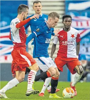  ??  ?? Steven Davis, in Europa League action (above), is also a candidate for Player of the Year, says Gary McAllister