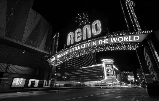  ?? WADE VANDEVORT FILE (2022) ?? The Reno Arch welcomes visitors on April 27, 2022. The city was known for quick divorces and was a more popular gaming destinatio­n than Las Vegas until the 1960s.