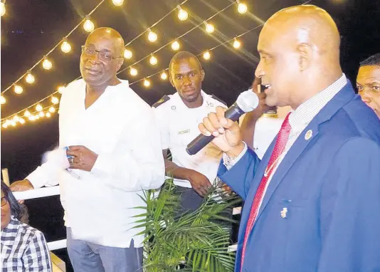  ?? FILE ?? Fritz Pinnock addresses a party held for then Education Minister Ruel Reid. An auditor general’s report uncovered that attempts were made to classify expenses related to the party as for a meeting.