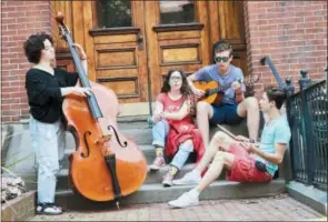  ?? KELLY DAVIDSON — BERKLEE COLLEGE OF MUSIC VIA AP ?? This 2017 photo provided by Berklee College of Music shows students participat­ing in Berklee’s Summer Programs in Boston, Mass.