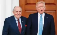  ?? ASSOCIATED PRESS FILE PHOTO ?? Then-President-elect Donald Trump, right, and former New York Mayor Rudy Giuliani pose for photos Nov. 20, 2016, at the Trump National Golf Club Bedminster clubhouse in Bedminster, N.J.