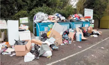  ??  ?? Rubbish spilled out from the recycling bins at Sutherland Grange during the festive season. Ref:132323-4