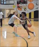  ?? lorene Parker ?? Senior Tyler Rowland and Junior Tyler Hardy go one on one in practice.