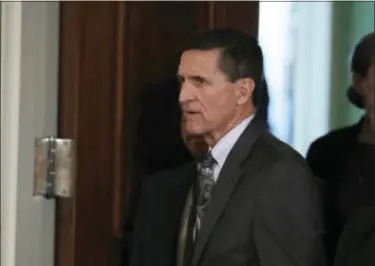  ?? EVAN VUCCI — THE ASSOCIATED PRESS FILE ?? In this file photo, then-National Security Adviser Michael Flynn in the East Room of the White House in Washington. Two top House Democrats are questionin­g whether former Trump National Security Adviser Michael Flynn failed to report a 2015 trip to the...