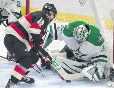  ?? ADRIAN WYLD/THE CANADIAN PRESS ?? Ryan Dzingel of the Senators pressures Dallas Stars goalie Kari Lehtonen in second period Thursday night.