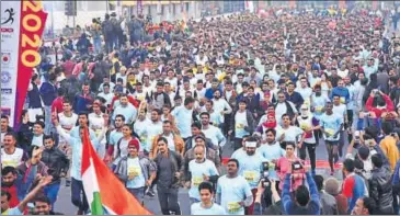  ??  ?? Runners participat­e in the Jaipur Marathon on JLN Road on Sunday morning.
HT PHOTO