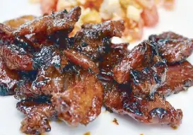  ??  ?? Tocino, the sweet cured pork from Pampanga