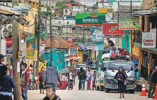  ?? Photograph­s by Marcus Yam Los Angeles Times ?? MANY ASYLUM seekers say they f led Central America because of gang violence and political turmoil. In Todos Santos, Guatemala, migration is driven by economics.