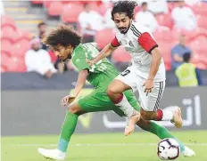  ?? Courtesy: Al Jazira twitter ?? Al Jazira’s Khalfan Mubarak steams past Emirates’ Saad ■ Surour in the Pride of Abu Dhabi’s 6-0 win over the Falcons.