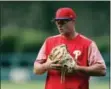  ?? MATT SLOCUM — THE ASSOCIATED PRESS ?? Phillies’ new left fielder Rhys Hoskins warms up before making his Major League debut Thursday night against the Mets and tough starter Jacob deGrom.