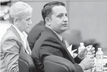  ?? LANNIS WATERS/PALM BEACH POST VIA AP, POOL ?? Nouman Raja listens to witness testimony during his trial Tuesday in West Palm Beach. Raja, a former Palm Beach Gardens police officer, is charged with shooting and killing stranded motorist Corey Jones on Oct. 18, 2015.