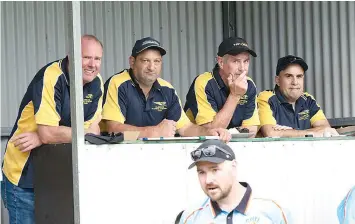  ?? ?? Keeing a close eye on the game between Trafalgar and Ellinbank on Saturday are (from left): Kristian Bingham, Mario DiGrandi, Rob Ballingall, John Jacavou.