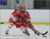  ?? TIM PHILLIS — FOR THE NEWS-HERALD ?? Mentor’s Jack Geduldig works up the ice against Shaker Heights on Feb. 23 in Brooklyn.