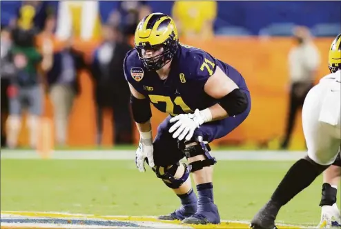  ?? Icon Sportswire / via Getty Images ?? Michigan offensive lineman Andrew Stueber during the Orange Bowl against Georgia on Dec. 31 at Hard Rock Stadium in Miami Gardens, Fla.