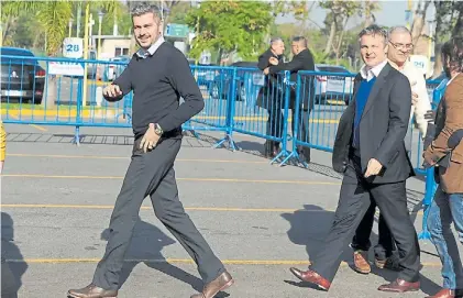  ?? RUBÉN DIGILIO ?? Dúo. Marcos Peña y Fernando de Andreis, al llegar el viernes pasado a la cumbre de Cambiemos.