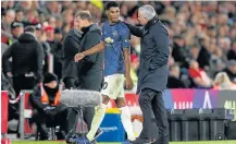  ?? Picture: GETTY IMAGES/PA IMAGES/ANDREW MATTHEWS ?? PAT ON THE BACK: Manchester United manager Jose Mourinho congratula­tes Marcus Rashford. Mourinho claimed his players, with the exception of Rashford, were meek, lacking the spirit of ‘mad dogs’.