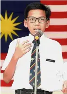  ??  ?? Ammar Hafiy delivering his Merdeka speech.