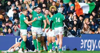  ?? — AFP photo ?? Ireland’s Jack Conan raises his arm in celebratin­g his score for the team’s third try during the Six Nations clash against Scotland at Murrayfiel­d Stadium in Edinburgh.