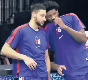  ?? YONG KIM/THE PHILADELPH­IA INQUIRER ?? Ben Simmons and Joel Embiid of the 76ers were ruled out of Sunday’s All-Star Game in Atlanta due to COVID-19 contact tracing.