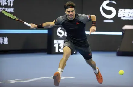  ?? — AP ?? Tunisia’s Malek Jaziri returns to Alexander Zverev of Germany in their China Open second round match at the National Tennis Stadium in Beijing Friday. Jaziri won 7- 6 ( 7/ 4), 2- 6, 6- 4.