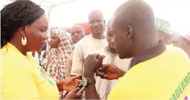  ?? Photo: GDM ?? Enumerator­s make payments to beneficiar­ies at the launch of TraderMoni in Yola at the weekend.