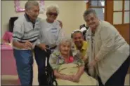  ?? KEITH REYNOLDS — THE MORNING JOURNAL ?? Theresa Sedano (center) celebrated her 100th birthday May 28 at Anchor Lodge Retirement Village, 3756 West Erie Ave. in Lorain. She is surrounded by (from left) Tony Rodgers, Julie DiLuciano, Tony Separito and Sophie Toth.