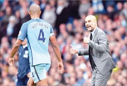  ?? AFP ?? Manchester City manager Pep Guardiola has spent £215 million on players so far in the summer transfer window. Premier League spending is already close to £800 million with over a month before the market closes.