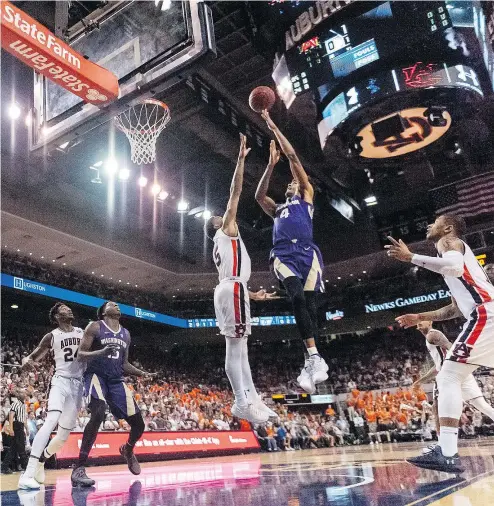  ?? — THE ASSOCIATED PRESS FILES ?? Washington guard Matisse Thybulle goes up for a shot during a NCAA game against Auburn earlier this month. The Huskies are one of four men’s teams taking part in the TCL Vancouver Showcase.