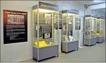  ?? Kyra Thomas ?? The exhibit features display cases that take visitors through the story of the 6888th, from the creation of the Women’s Army Auxiliary Corps in 1942 to their return to the U.S. in 1946.
♦